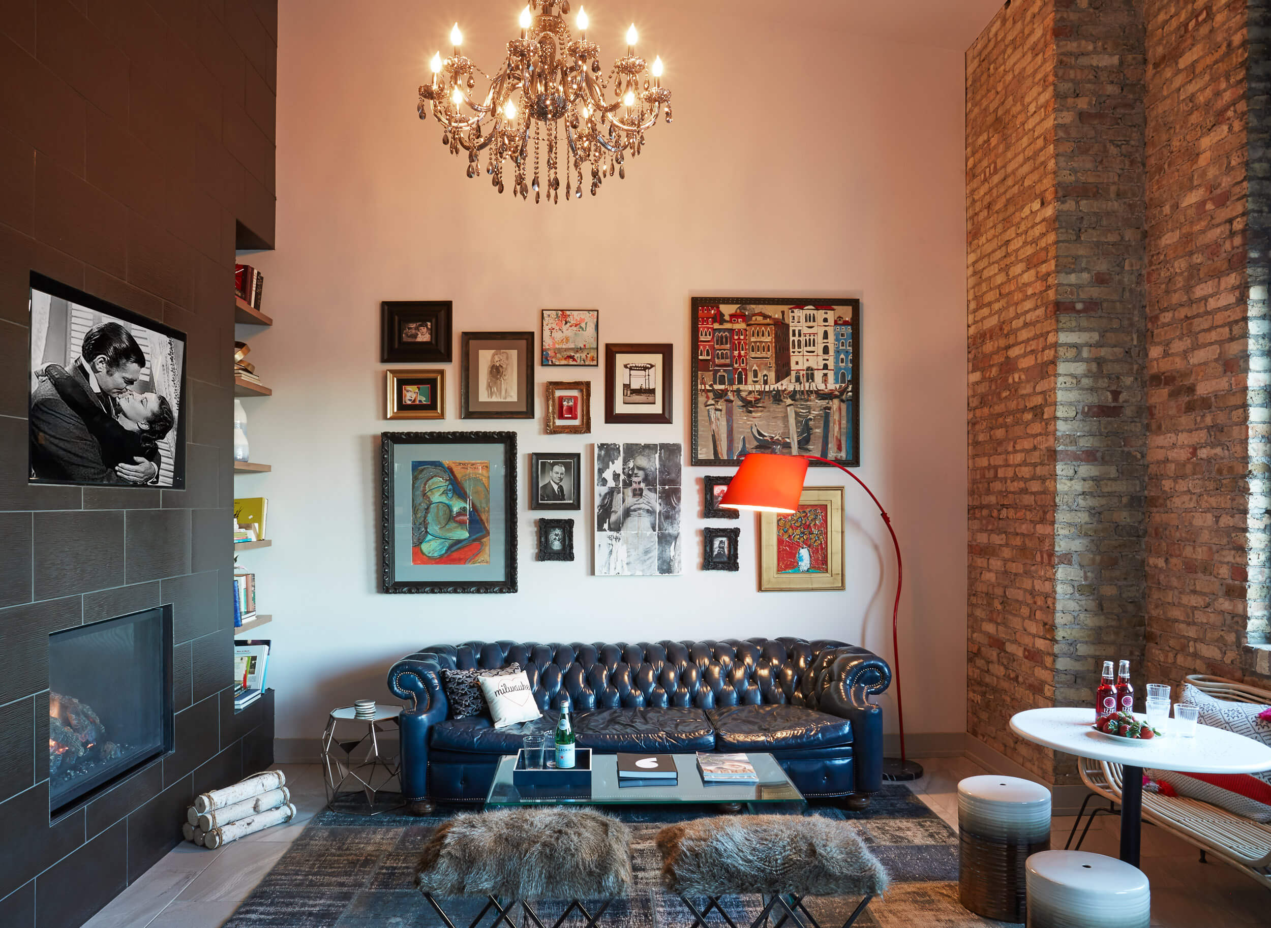 sitting-area-art-gallery-wall-decor-tile-fireplace-open-shelving-brick-wall-wisconsin-peabodys-interiors